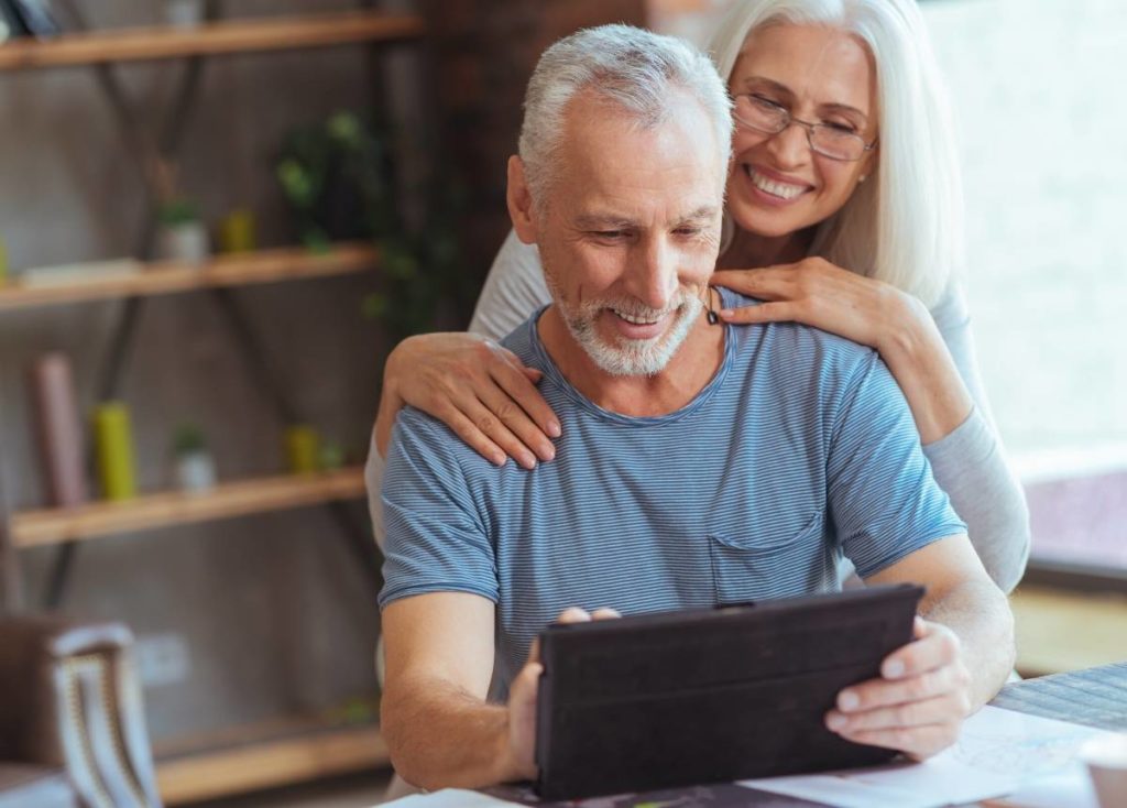 Senior couple learning about reverse mortgages