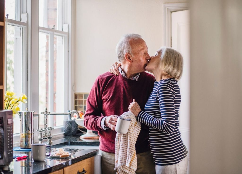 senior citizens kissing