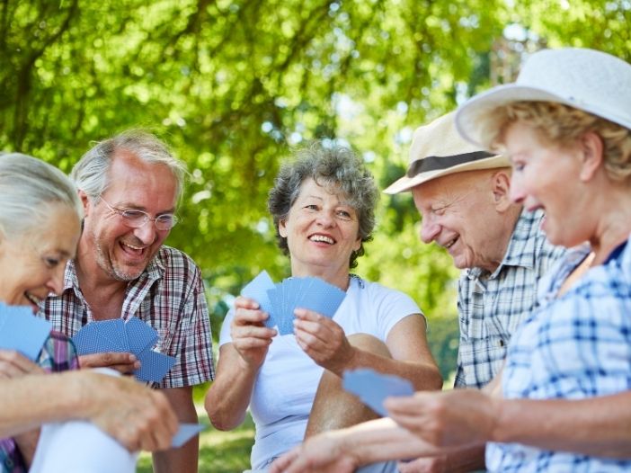 seniors playing cards